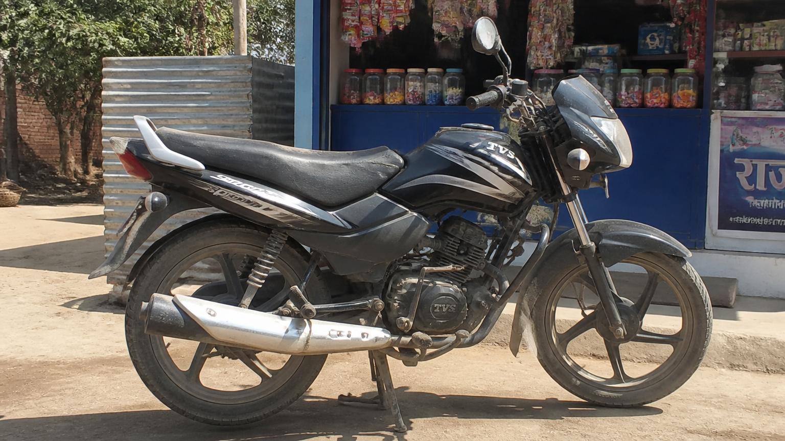 TVS Sport commuter motorcycle in India — 8.29 PS engine, 70-75 kmpl mileage and on-road price around ₹72,500